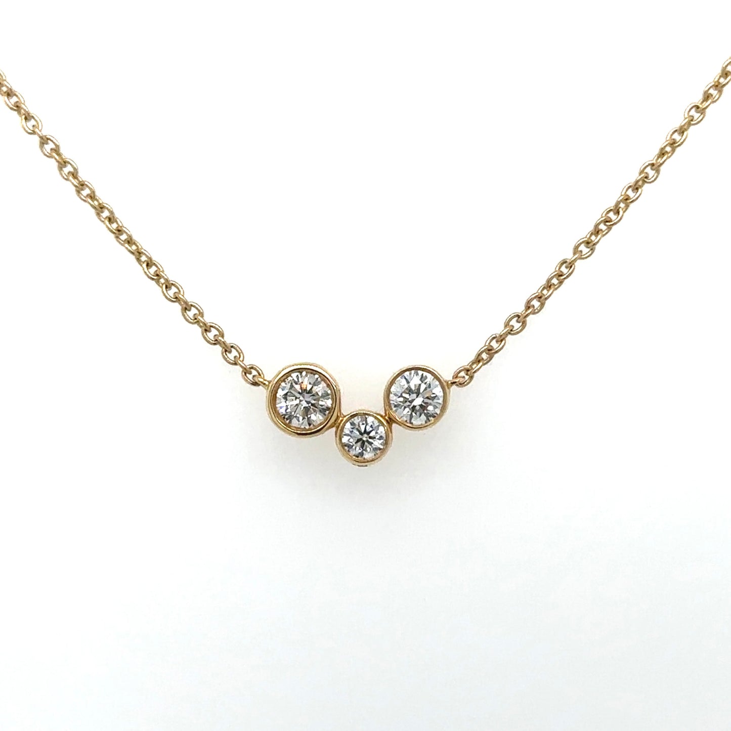 18ct yellow gold three stone diamond bubble necklace.