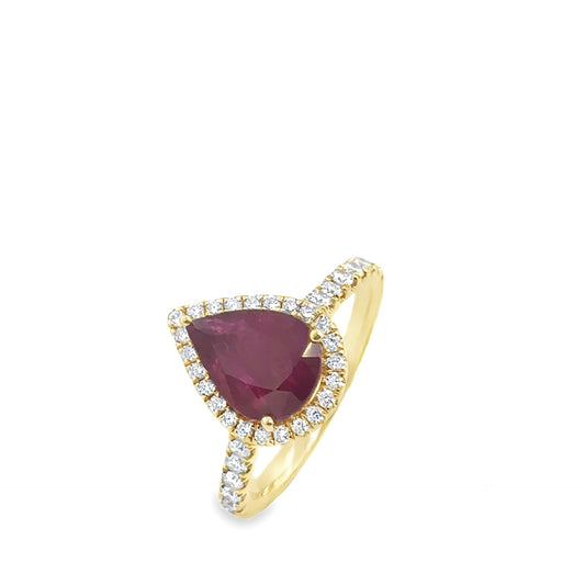 18ct yellow gold pear cut ruby and brilliant cut diamond halo ring.