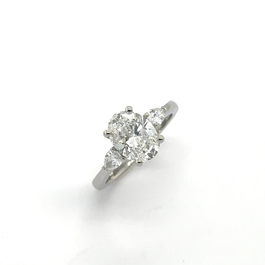 LAB GROWN: One platinum oval and pear cut diamond 3st ring - 2.00ct / 0.35ct.