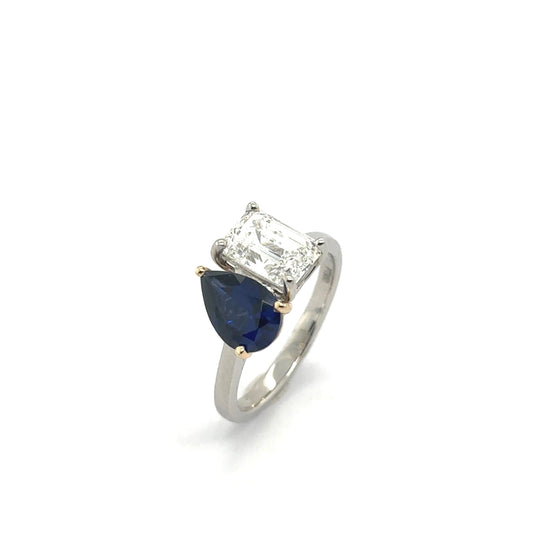 LAB GROWN: Platinum & 18ct yellow gold lab-grown pear shape blue sapphire and lab-grown emerald cut diamond ' Moi Et Toi' ring - D1.90ct / S1.42ct.