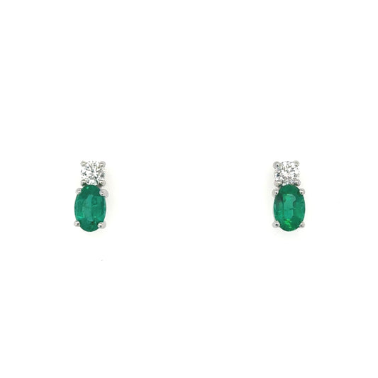 One pair oval emerald and brilliant cut diamond stud earrings.