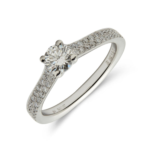 Platinum brilliant cut diamond solitaire ring with double row pave set shoulders - 0.72ct