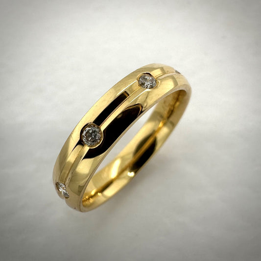 18ct yellow gold diamond set 4.0mm wedding band - 0.12ct.