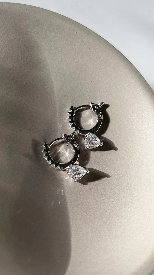 Carat 'Amare' sterling silver pear shaped cubic zircornia earrings.