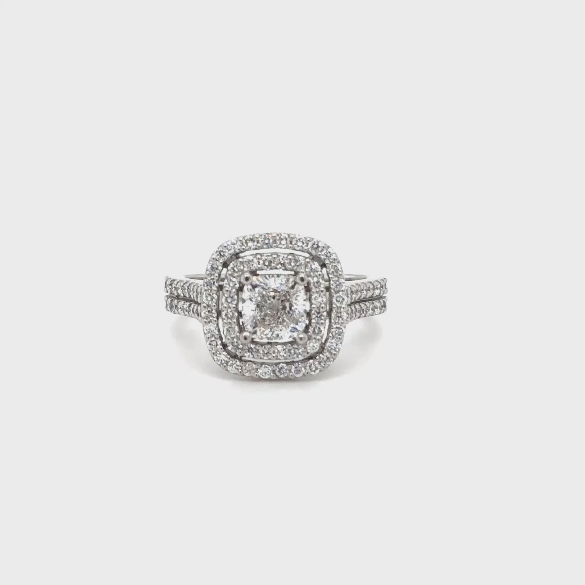 Platinum & cushion cut diamond cluster ring 