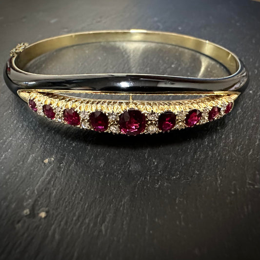 Pre owned ruby & diamond enamel oval hinged bangle - 0.40ct