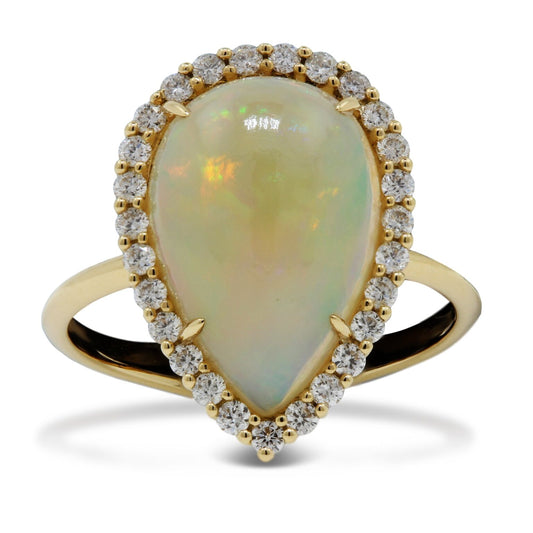 18ct Yellow Gold Pear Shaped Cabochon Opal and Diamond Halo Set Ring.