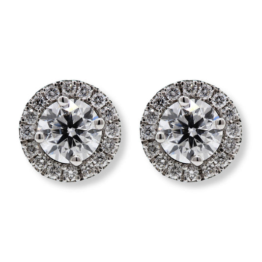 18ct white gold round brilliant cut diamond halo set stud earrings.