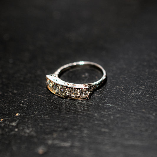 00016018 Pre-Owned: One precious white metal diamond set graduated eternity ring - 1.19ct.